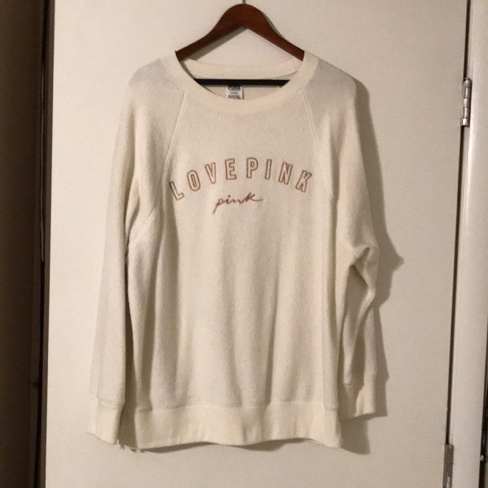 PINK cream colored sweatshirt. Size medium
